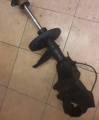 Front shock absorber with coil spring