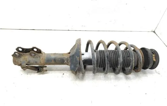 Volkswagen Golf III Front shock absorber with coil spring 357412319B