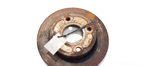 Mazda 121 SM Front brake disc neventiliuojamas