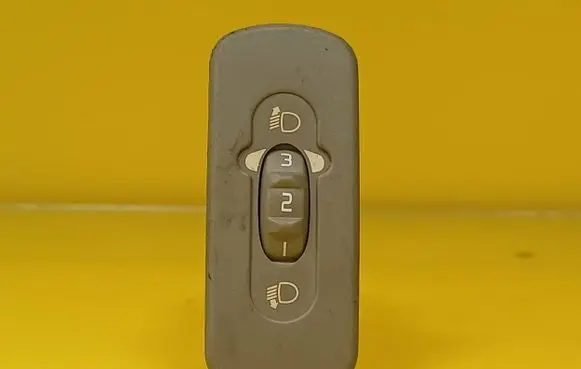 Headlight level height control switch
