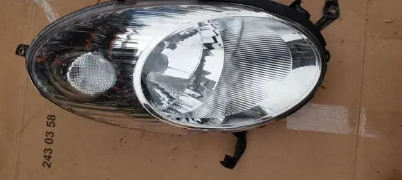Nissan Micra Headlight/headlamp 89008335
