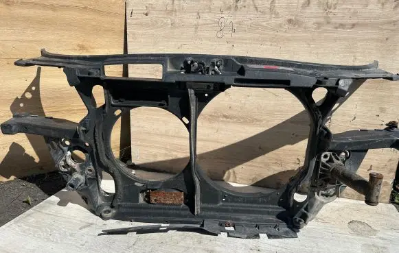 Radiator support slam panel