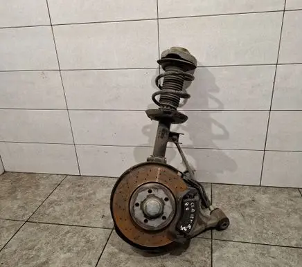 Front wheel hub spindle knuckle