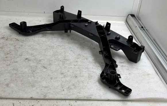 Radiator support slam panel bracket
