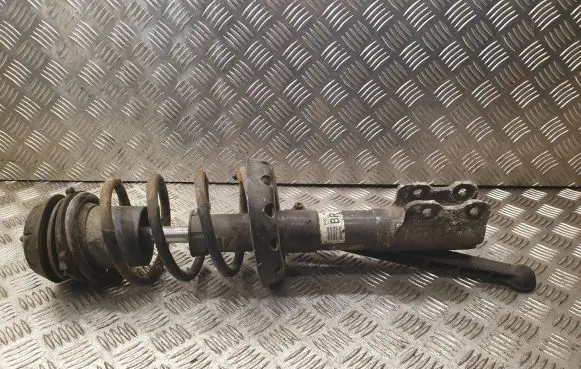 Opel Astra G Front shock absorber with coil spring 90576823