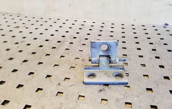 Rear door upper hinge