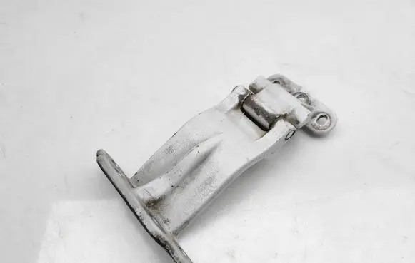Rear door upper hinge