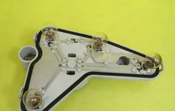Tail light bulb cover holder