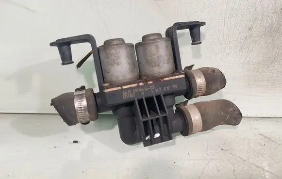 Coolant heater control valve