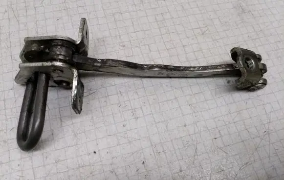 Opel Astra G Front door check strap stopper 24434085 ES700304