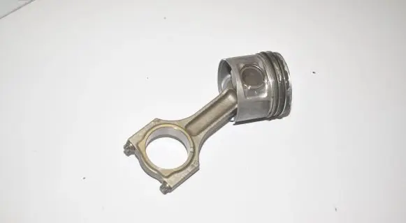 Piston with connecting rod