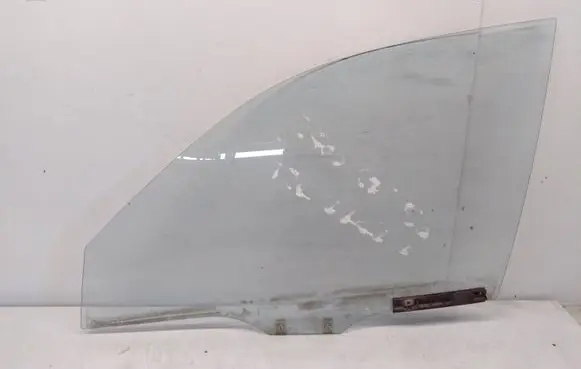 Mazda 121 Front door window glass four-door