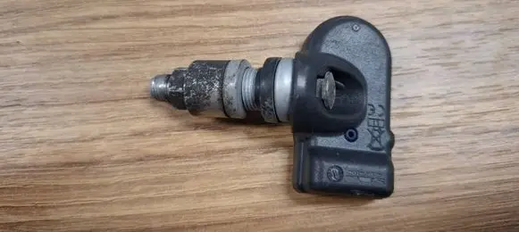 Opel Astra J Tire pressure sensor YMY030189
