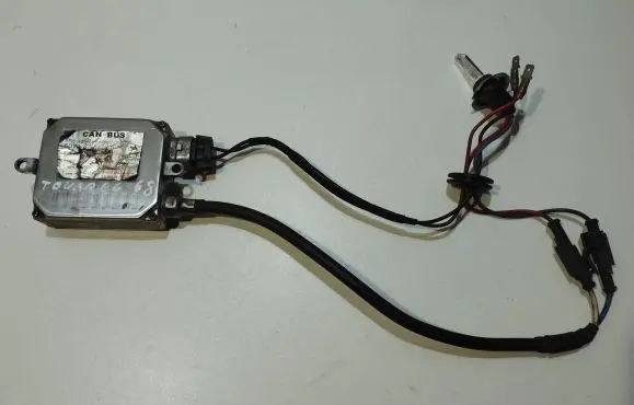 Volkswagen Touareg I Headlight ballast module Xenon