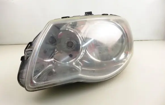 Chrysler Voyager Headlight/headlamp 04857831AB
