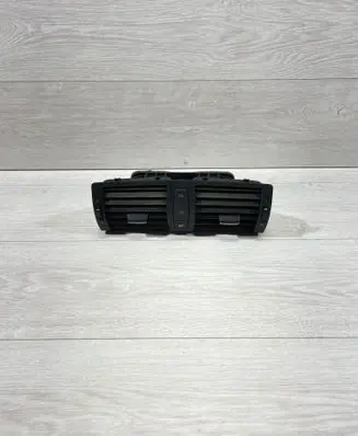 Dash center air vent grill