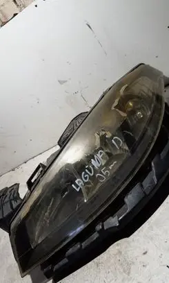 Renault Laguna II Headlight/headlamp 89900469