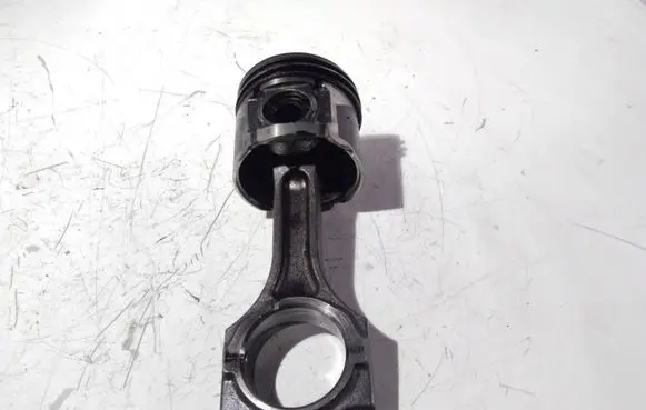 Piston with connecting rod