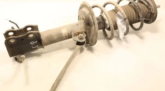 Toyota Yaris Front shock absorber with coil spring