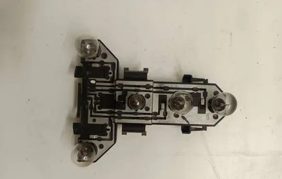 Volkswagen Golf IV Tail light bulb cover holder 69918380