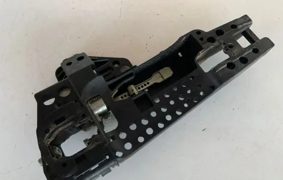 Rear door exterior handle/bracket