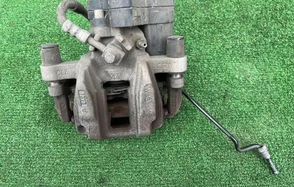 Volkswagen Caddy Rear brake caliper 5WA615405AJ