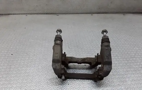Toyota RAV 4 (XA50) Brake caliper pad carrier rear 