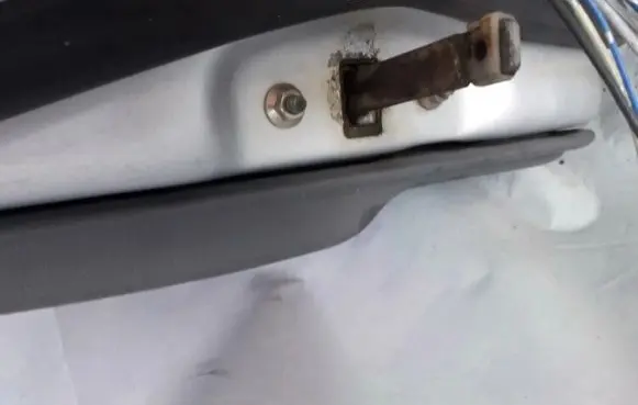 Mazda 626 Rear door check strap stopper