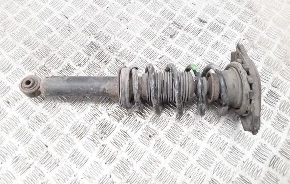 Nissan Primera Rear shock absorber with coil spring 