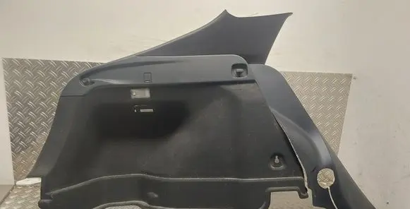 Trunk/boot lower side trim panel