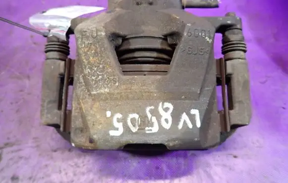 Opel Astra J Front brake caliper