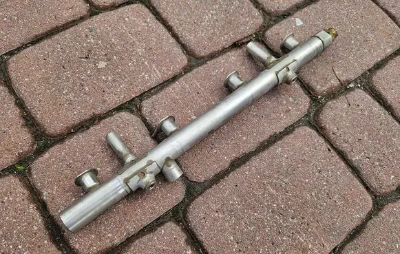 Volkswagen Golf VII Fuel main line pipe 06K133317AB