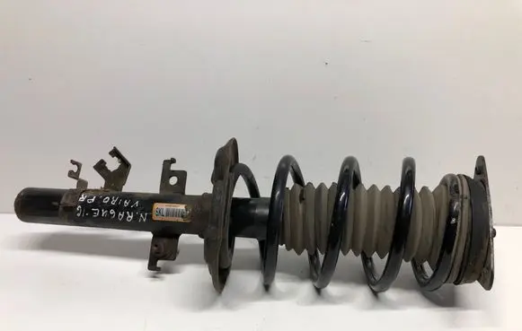 Nissan Rogue Front shock absorber with coil spring 543034BA1C