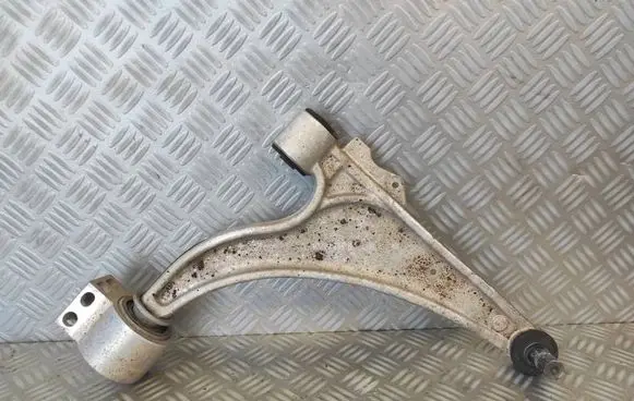 Opel Astra J Front control arm 13401130