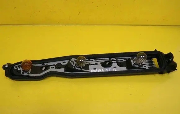Opel Corsa C Tail light bulb cover holder