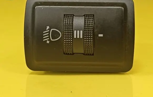 Headlight level height control switch