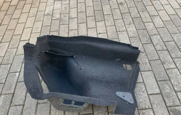 Trunk/boot lower side trim panel