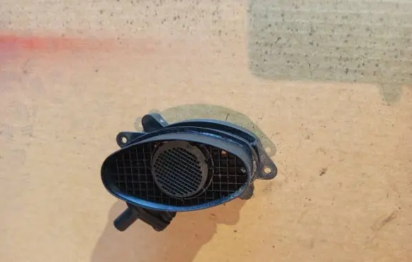 BMW 5 E39 Mass air flow meter 7787076 0928400488