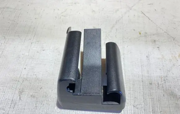 Front driver seat rail trim
