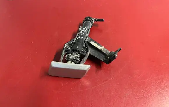 Cadillac SRX Headlight washer spray nozzle