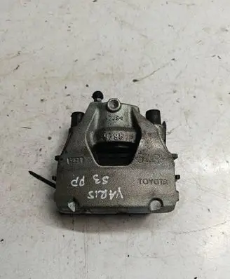 Toyota Yaris XP210 Front brake caliper 