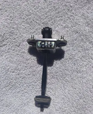 Subaru Outback Rear door check strap stopper 63302FC002