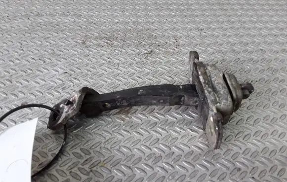 Front door check strap stopper