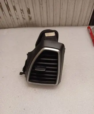 Hyundai Tucson TL Dash center air vent grill 97490D7AB0TS