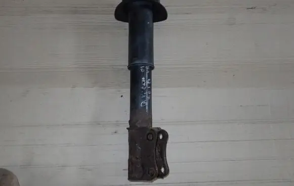 Suzuki Grand Vitara I Front shock absorber with coil spring