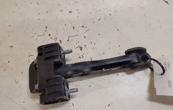 Front door check strap stopper