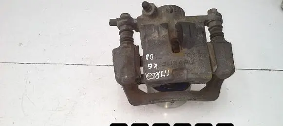 Subaru Impreza III Rear brake caliper tokico