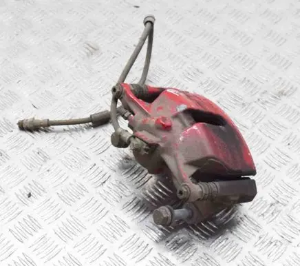 Volkswagen Golf VII Front brake caliper