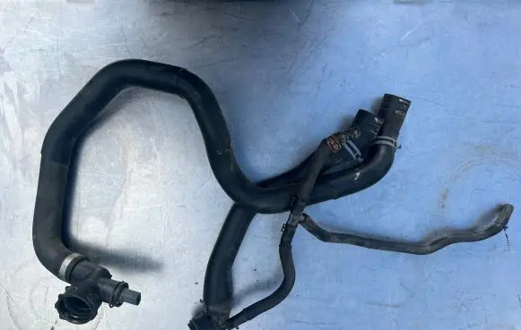 Volkswagen Golf VII Engine coolant pipe/hose 5Q0121049AC ZD010213