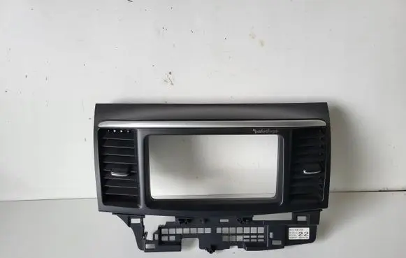 Mitsubishi Lancer X Dashboard center trim panel